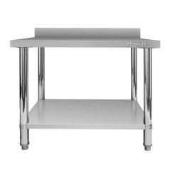 Nerezový gastro stůl přístěnný Mega‑M X STANDARD 1000×600×850 mm, 1 police, zadní lem 100 mm, MDF výztuha, nastavitelné nožky