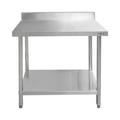 Nerezový gastro stůl přístěnný Mega‑M X STANDARD 1000×700×850 mm, 1 police, zadní lem 100 mm, MDF výztuha, nastavitelné nožky